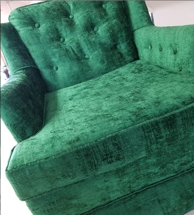 Upholstered green chair